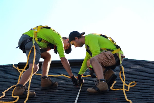 Professional roofing crew at work on a job site